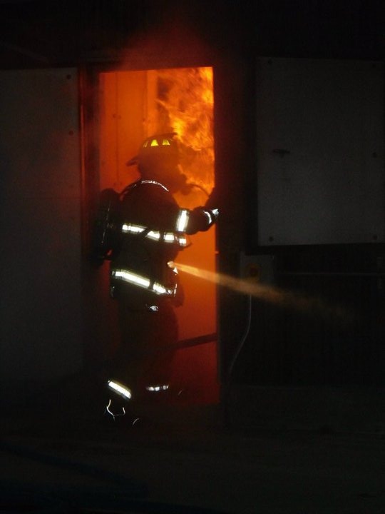 Chase at a live burn training facility