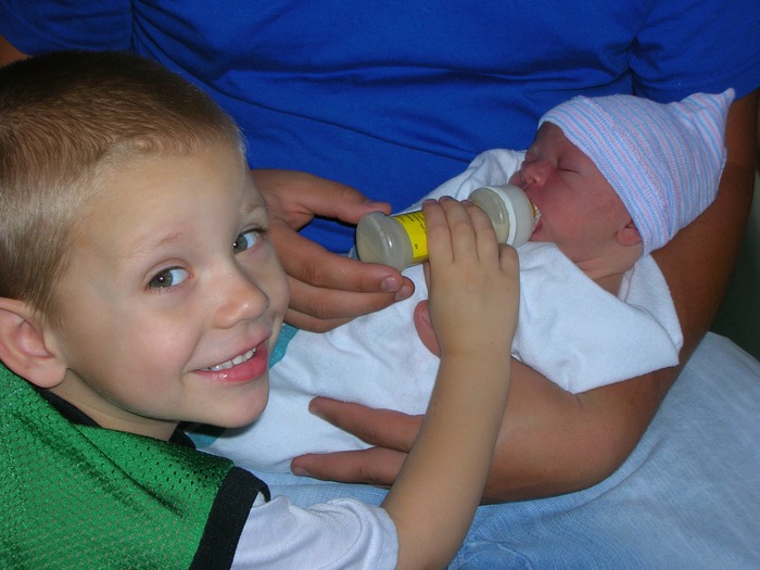 Emerson Feeding His Baby Brother