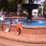 Kids playing in a fountain in Marietta, GA square