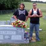 me and my nephew who is also my best friend at my granfathers grave