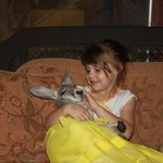 charity my granddaughter holding a baby kangaroo