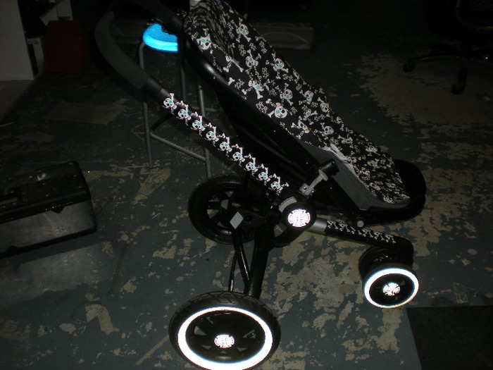 Shawn added the skulls to the sides and front of the stroller that matches the seat covers he made! 