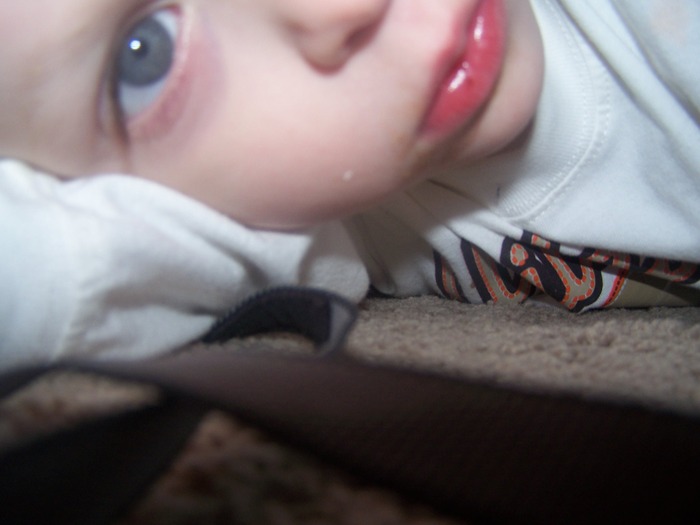 Elijah hid with the camera under the table and took a pic of himself. 