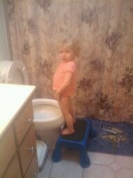 Taylor 19 months. Thinks she is one of the boys and cant understand why its not working, lol!!
