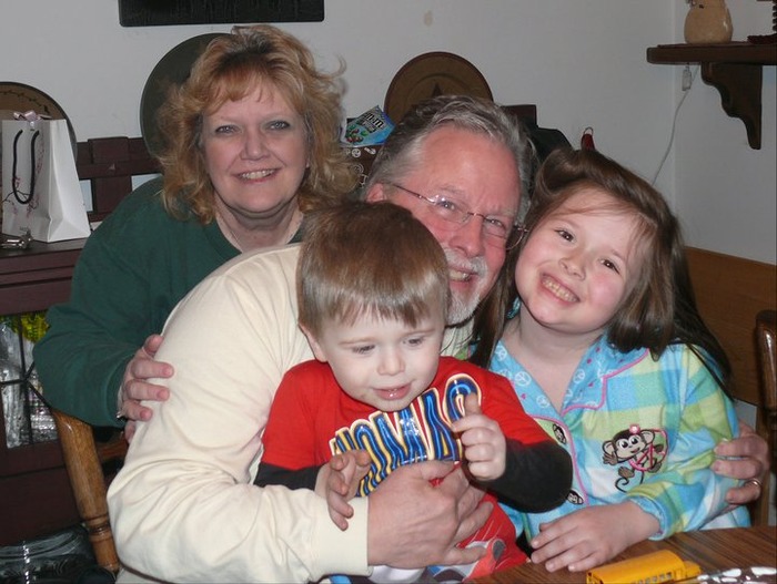 My wife and grandchildren help me celibrate my 60th birthday