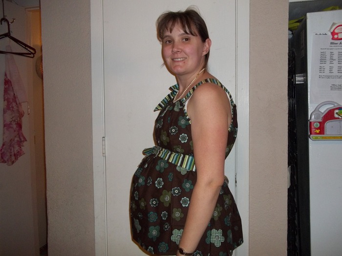 This is around 14.5 wks and in a maternity top I designed!
