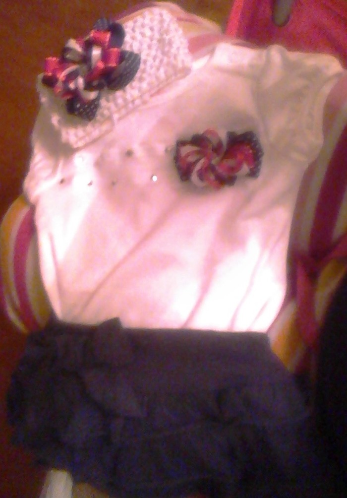 kind of blurry but this is Amy's first 4th of july outfit... :)