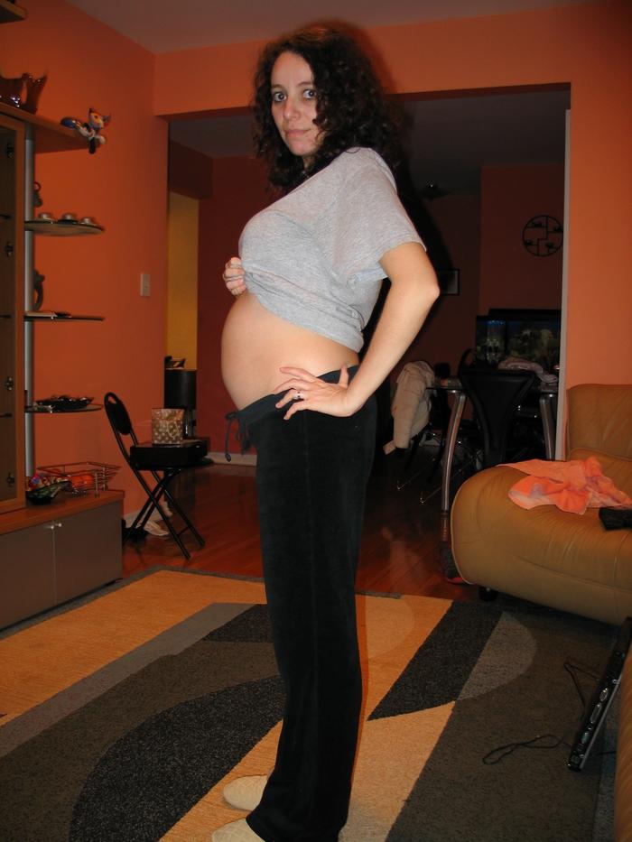 me at 16 weeks (Don't mind the mess in the background)