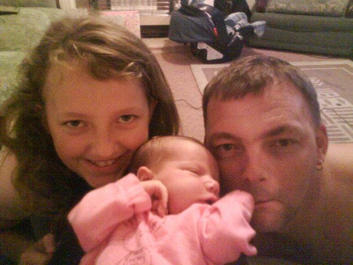 my daughter with daddy and sister