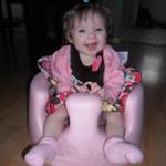 In her Bumbo Chair
