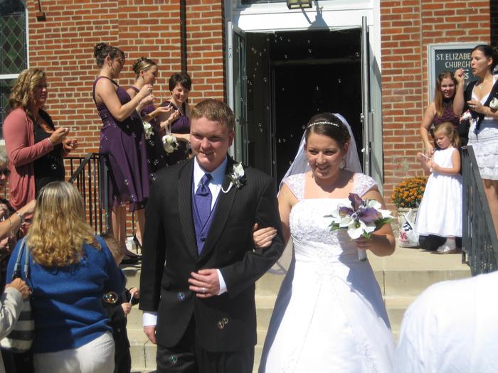 walking out of the church as Mr. and Mrs. Robertson
