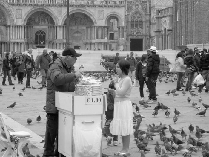 My oldest, Gina Marie, feeding the pigeons in Venice