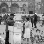 My oldest, Gina Marie, feeding the pigeons in Venice