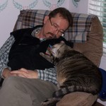 Taking a nap with Mr. Bill, my 23 lb. cat.