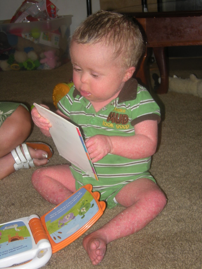 TJ Reading a book! (well looking at it anywayse)