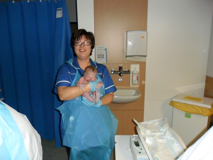 my new daughter with my wonderful midwife