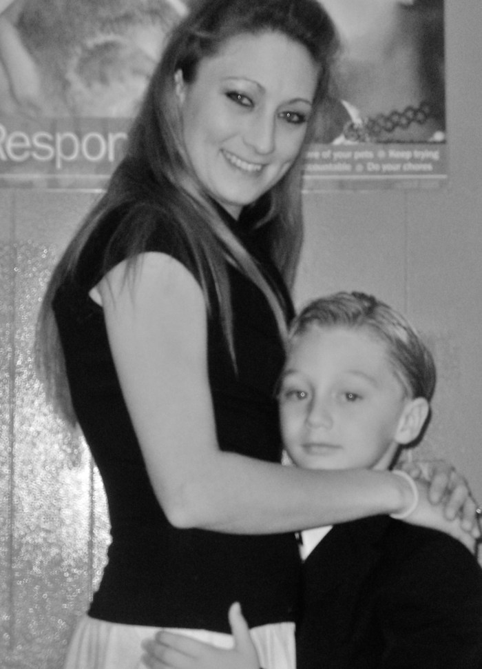 me and my son Logan at his Kinderg. Grad. the day after hospital stay for 2 year memory loss