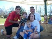 my family, me n hubby n kids and my bro in law in the red