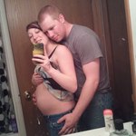 Me and my hubby! I was 19 weeks 3 days. 