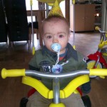 jake on his bike on his birthday with chicken pox