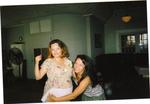 My sister Katy and I (measuring the belly-Grace)