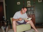 My oldest son, Al, seriously reading a B-day card in May   2007 