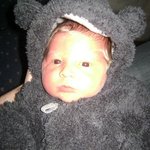 Fabian 4days old in his teddy bear suit