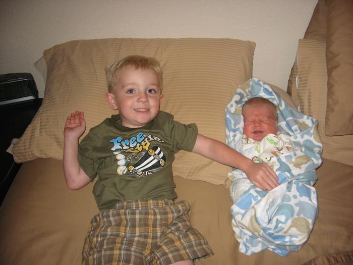 Maxim and new baby Aiden