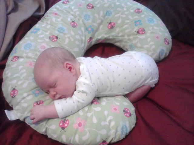 Sleeping on her Boppy!
