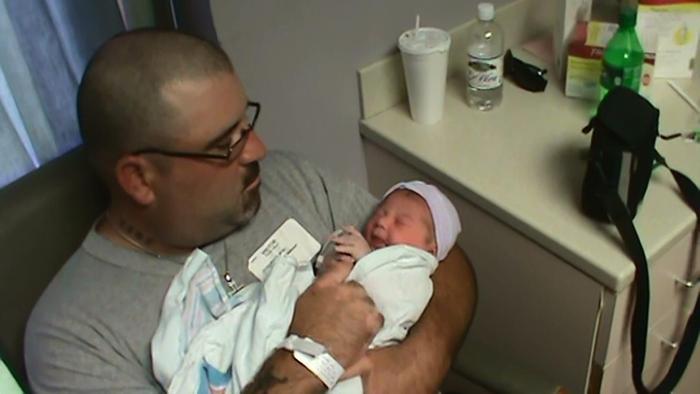 Daddys 1st time holding his baby girl