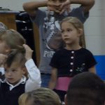 My oldest - Aidan - fixing his mohawk during his 1st grade music concert (lol)