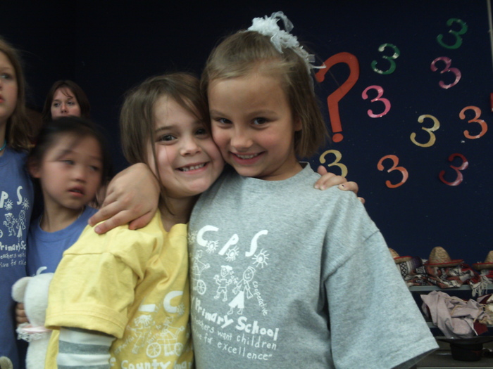 my babygirl in the gray shirt & her friend.
