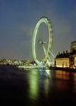 The London eye , a huge wheel that is a slow ride and lets you see the city of London