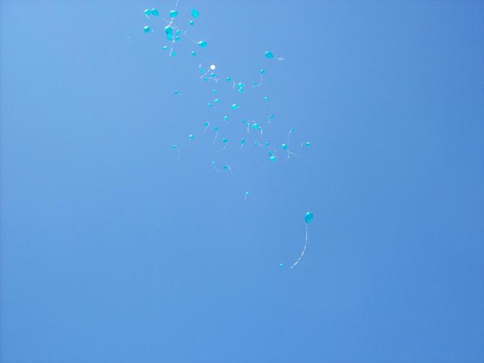 teal balloons in on high