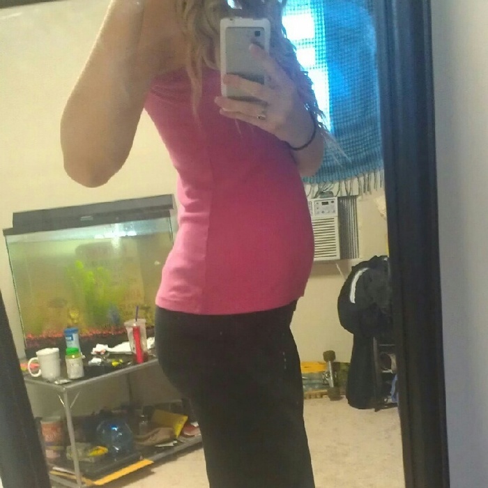 15 weeks. my belly is SLOWLY growing! (: