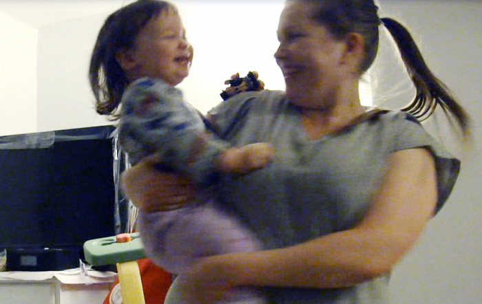 Just a screen capture from a video. Sydney & Mommy dancing :)