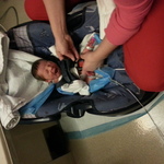 cassius takin the carseat challenge the first time! hes itty bitty:)