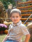 Mason's yearly pic I take at the Pumpkin patch. 10-2-08