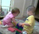 sarah and isaiah playing blocks