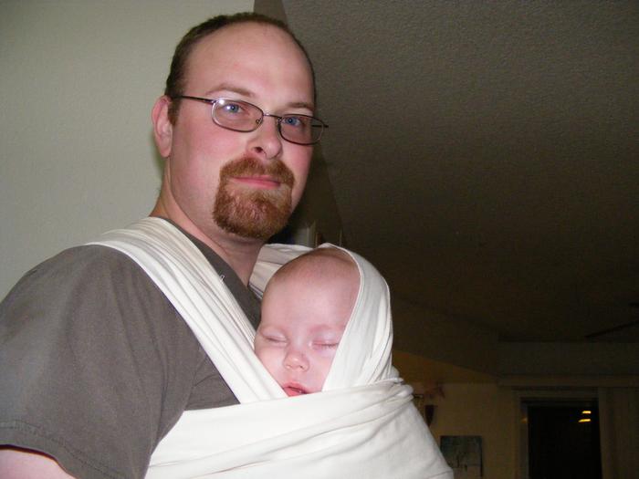 In a moby wrap, with dh, at 4 months
