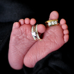 Xander's feet with our wedding rings