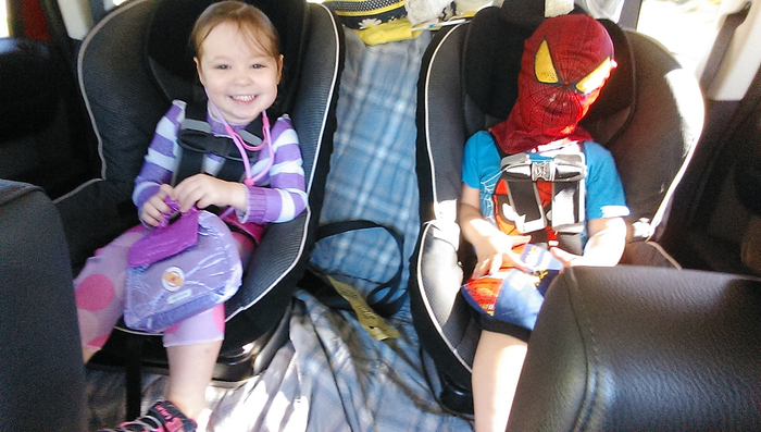 This is how we roll to school :) Doc Mcstuffins (left) and..well, you all know Spiderman.