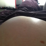 Bubs loving the left side of my belly!