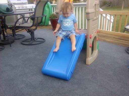 Drake mastering the slide :)  His shirt says "I still live with my parents"...lol