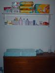 His shelf with all his diaper stuff, then his changing table/dresser which is FULL of clothes!