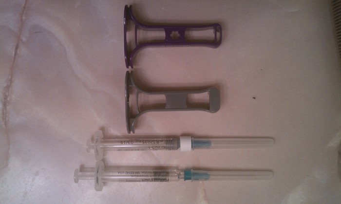 Avonex syringes and Avogrips, old and new