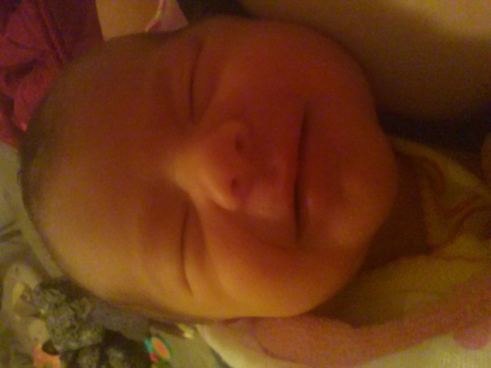 My beautiful baby smiling for mommy 3 days old!