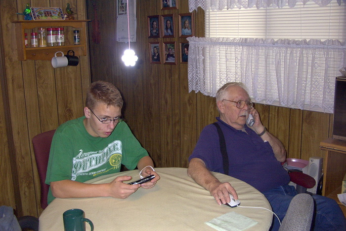 Jason on a home visit w/Grandpa 2005