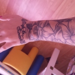 outside of my left arm, connected to the cover up