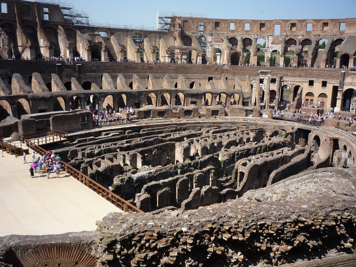 Roman colosseum with thousands of people